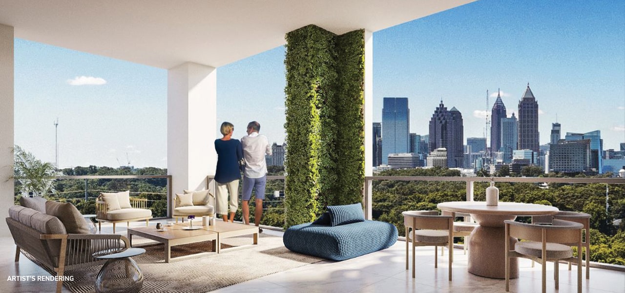 couple looking over the atlanta skyline